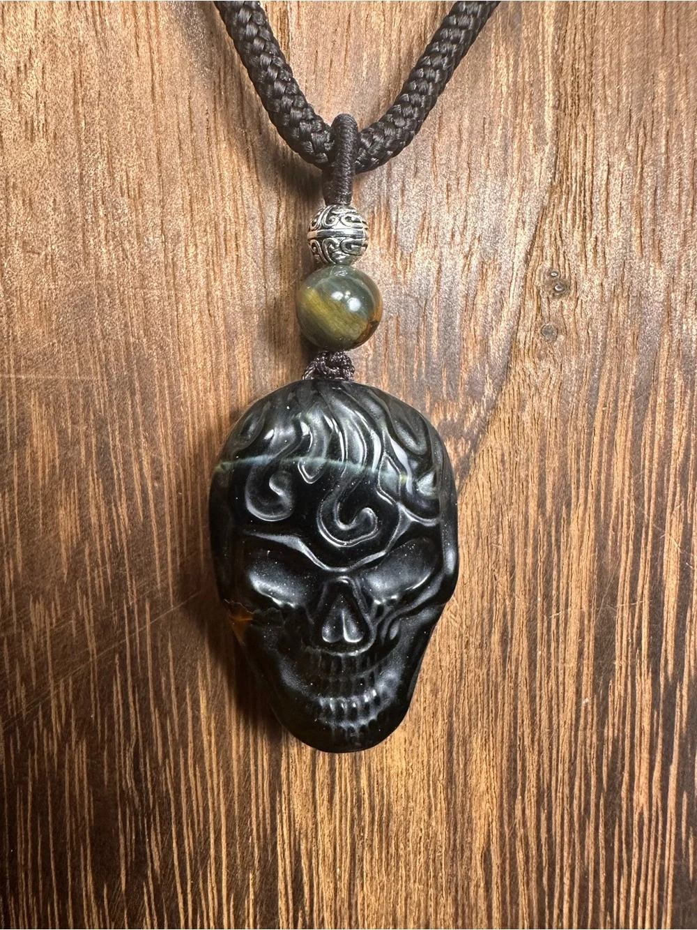 Unique Blue and Golden Tiger’s Eye Skull Carving Pendant Necklace on Brown